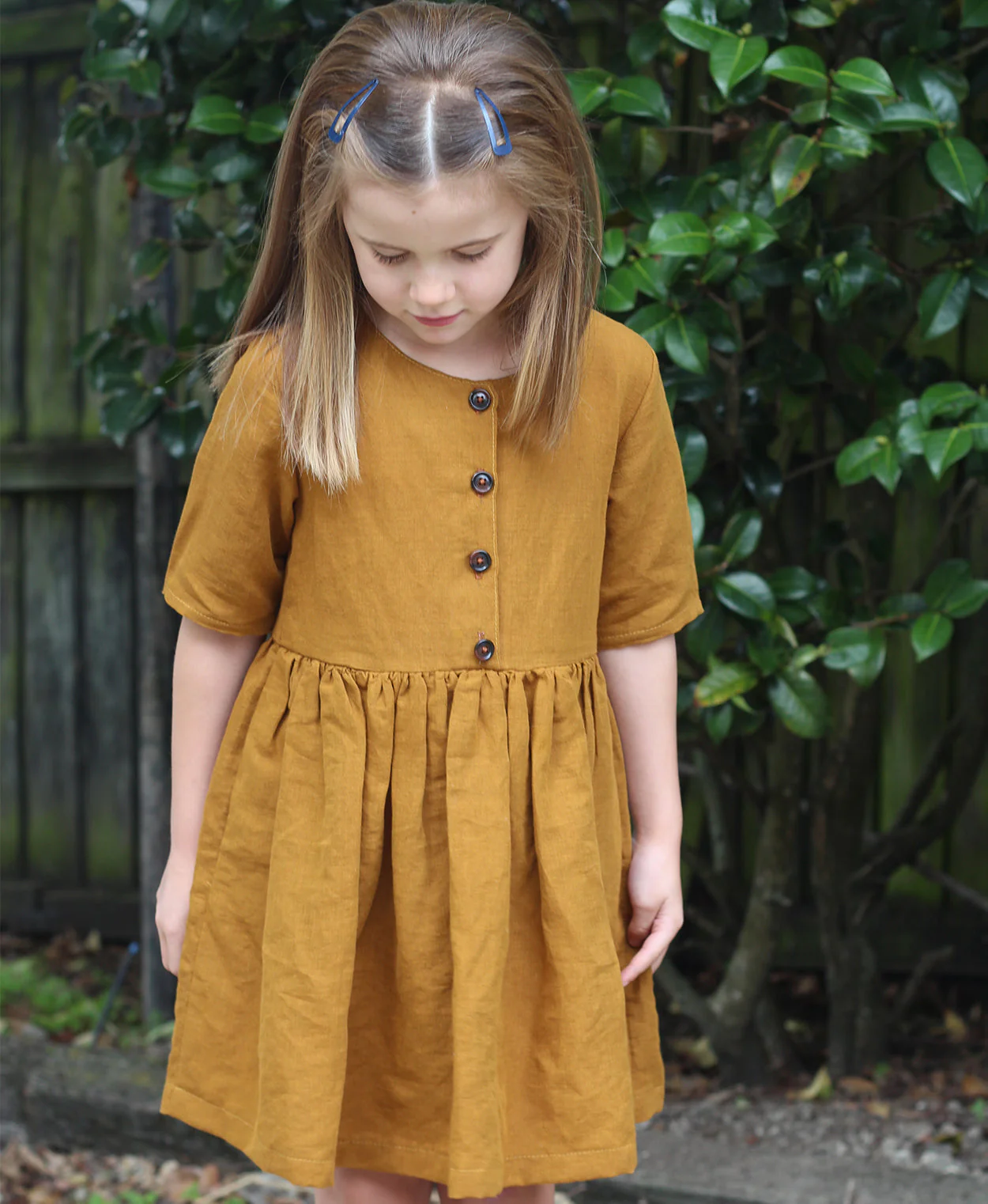 Below the K_whai Baby/Child Kauri Dress - Printed copy shop (+£5.00)