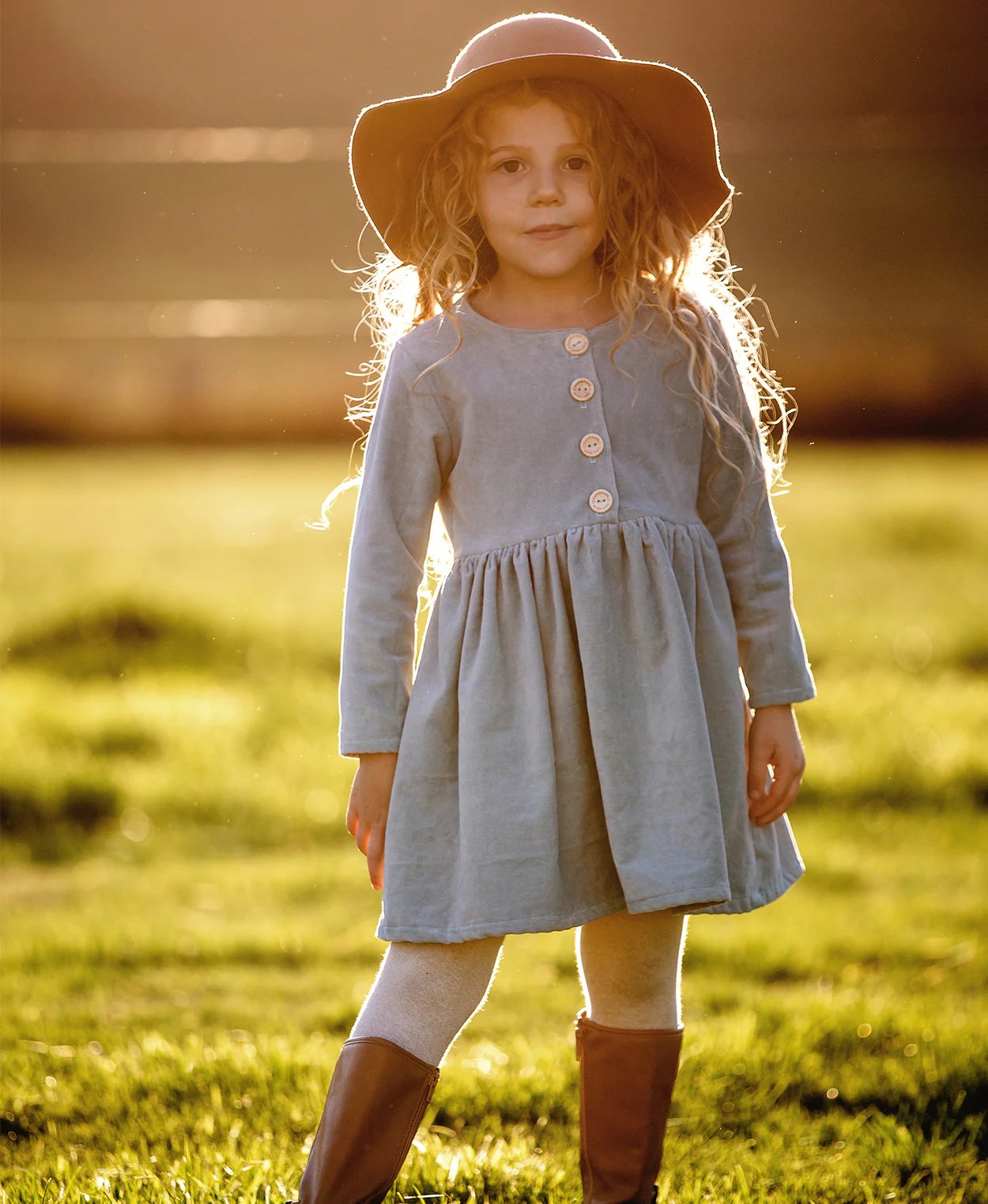 Below the Kōwhai Baby/Child Kauri Dress - Image 2